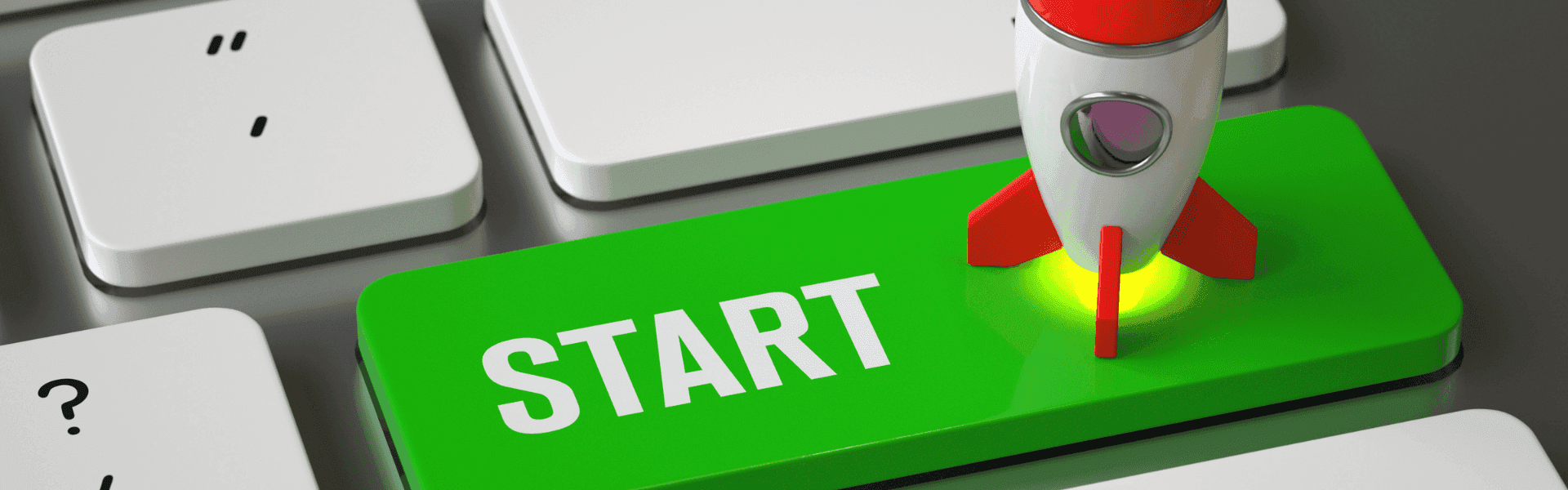 Auf der Computertastatur startet eine kleine weiß-rote Rakete